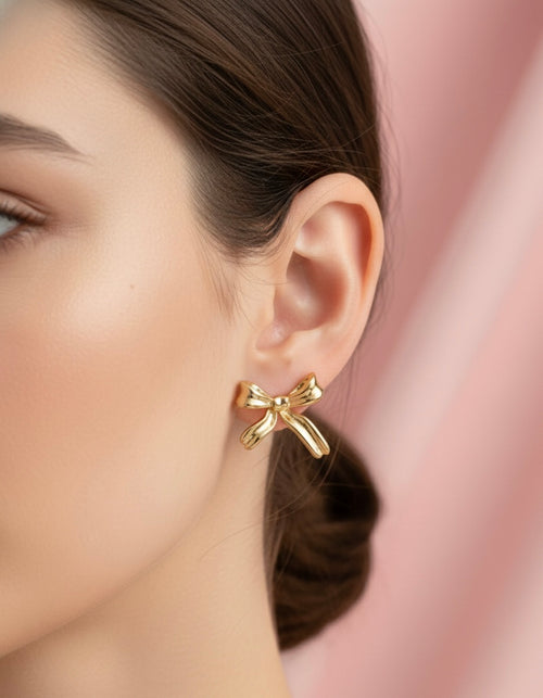 Gold bow earrings