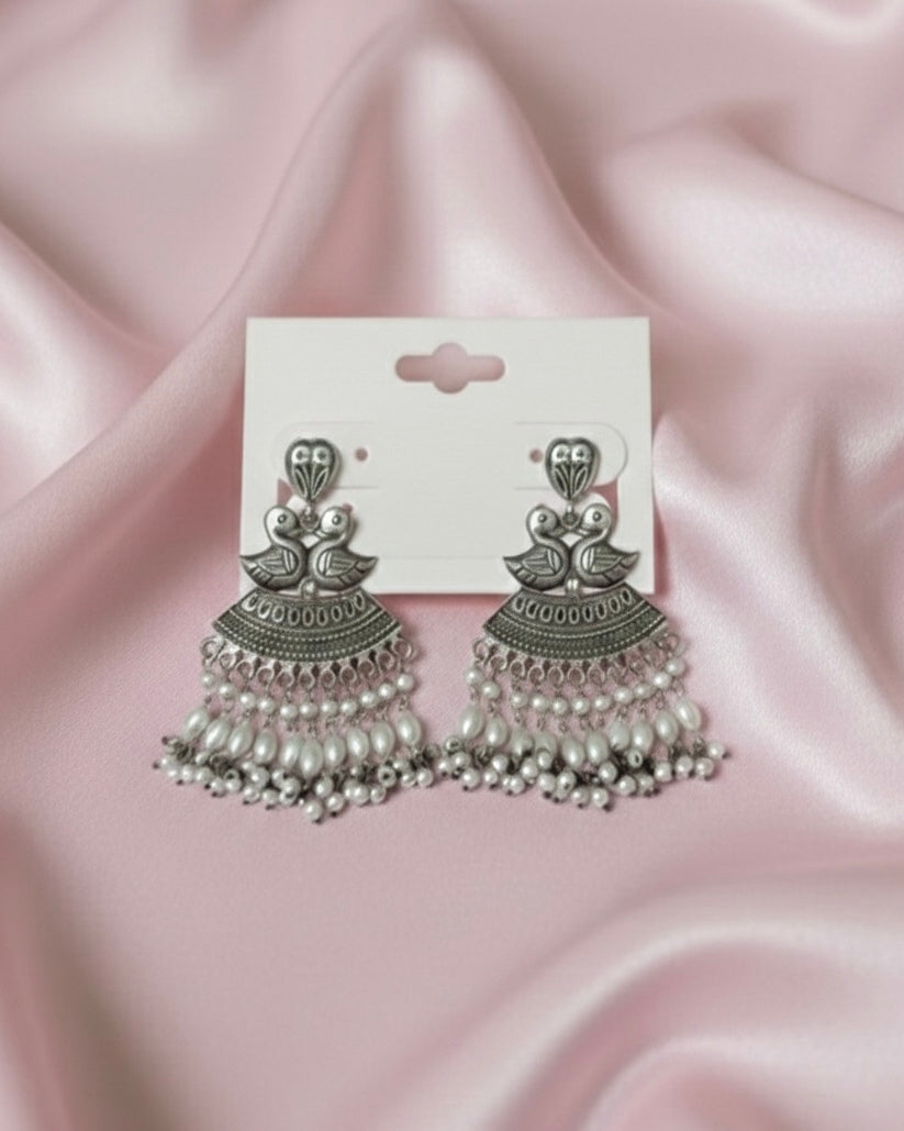 Silver duck earrings